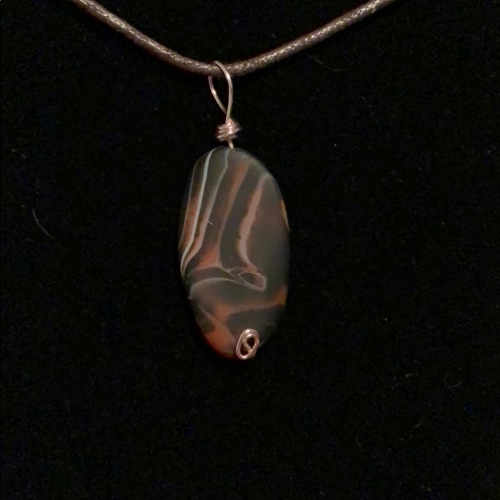 Swirly stone wrapped pendant